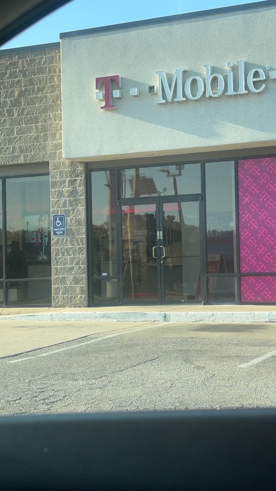 Exterior photo of T-Mobile Store at South Rock Rd & E Kellogg Ave, Wichita, KS