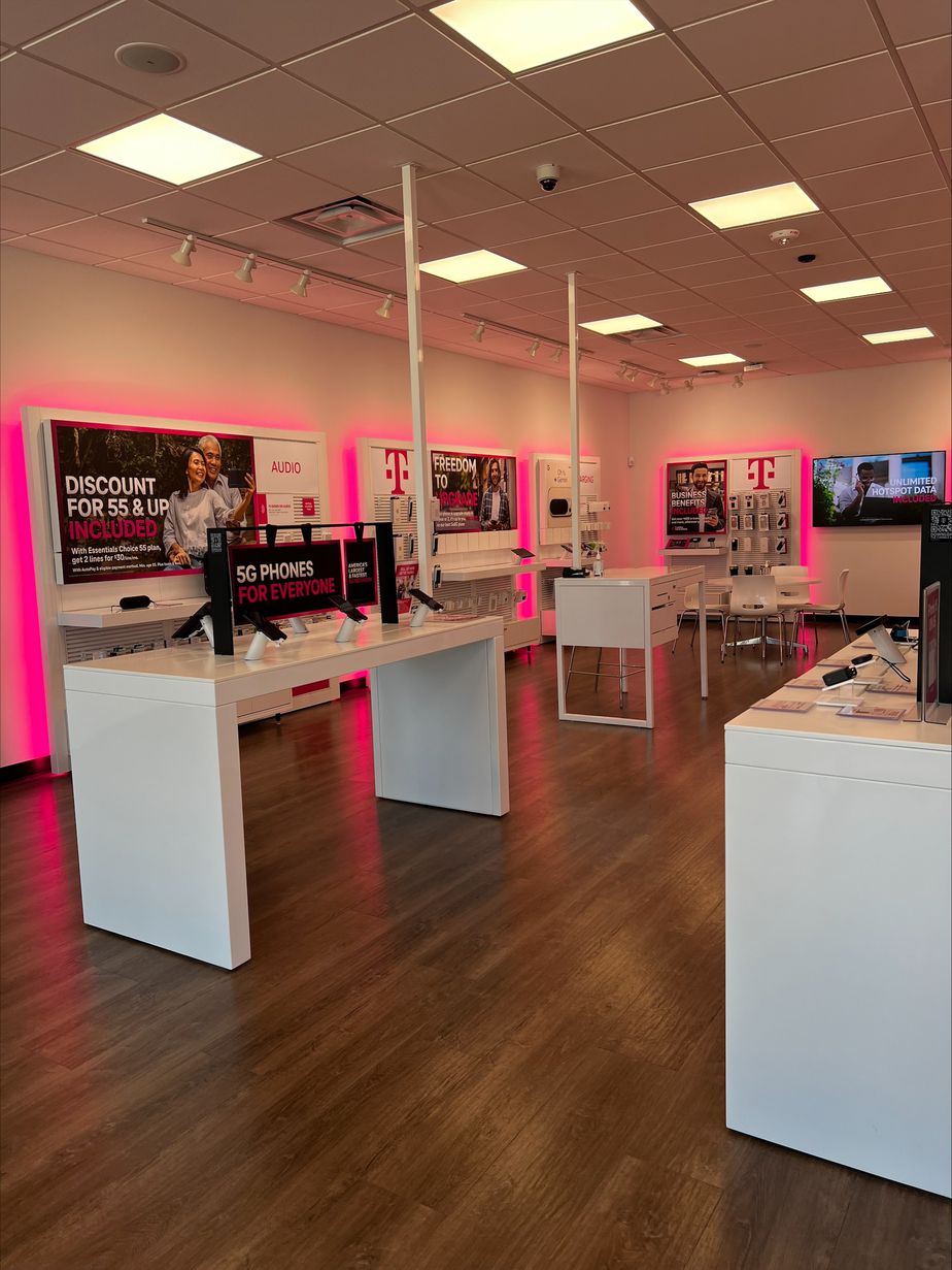 Interior photo of T-Mobile Store at Magnolia Village, Magnolia, TX