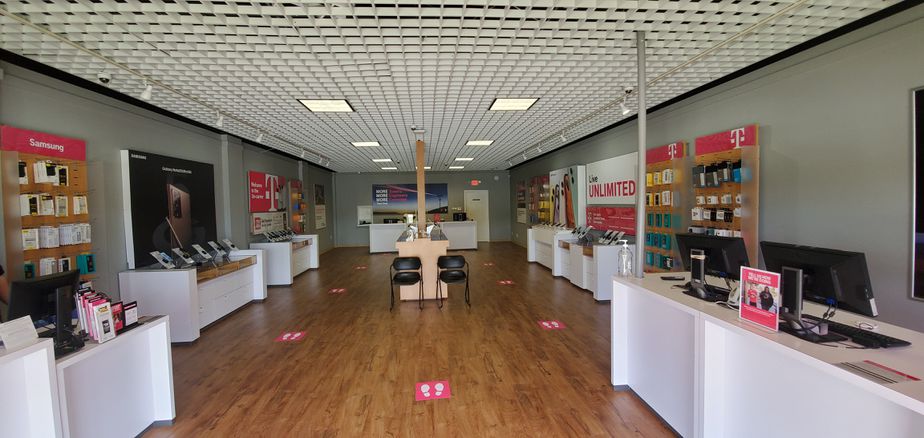 Interior photo of T-Mobile Store at E Merritt Is Cswy & Goodwin Dr, Merritt Island, FL