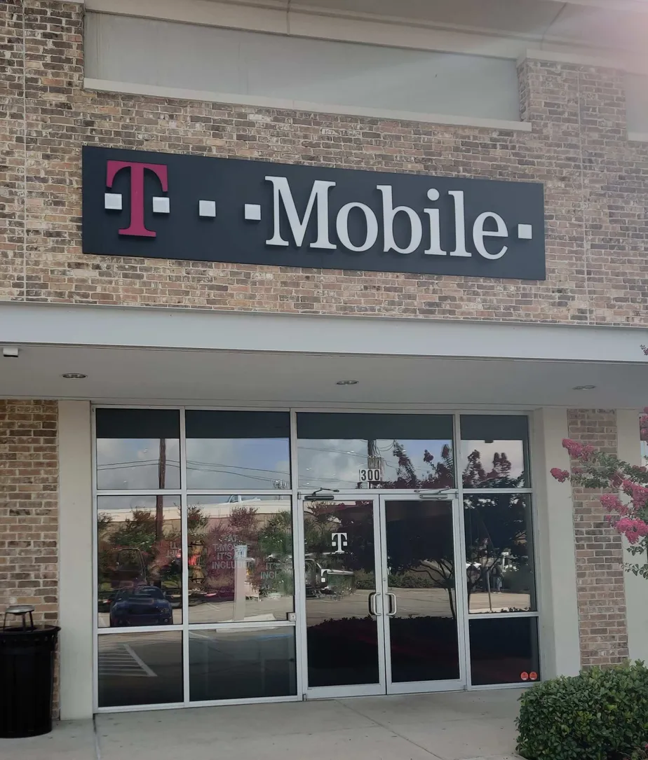  Exterior photo of T-Mobile Store at West Sam Houston Pkwy & West Rd, Houston, TX 