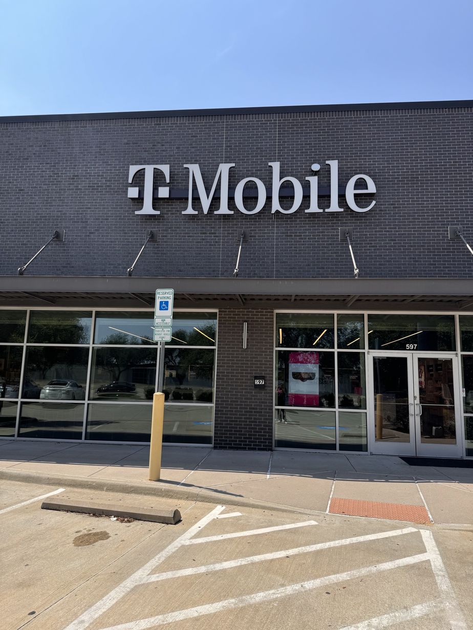 Exterior photo of T-Mobile Store at E Round Grove Rd & Vista Ridge Mall, Lewisville, TX