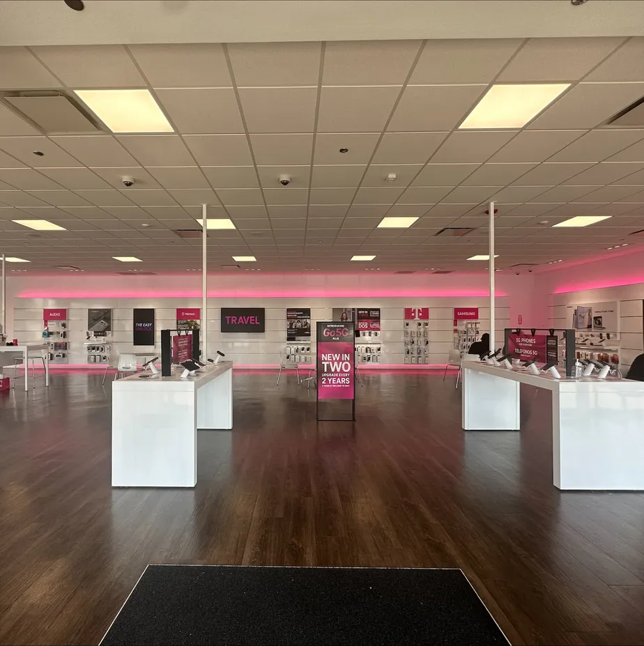 Interior photo of T-Mobile Store at Lincoln & Devon Ave, Chicago, IL