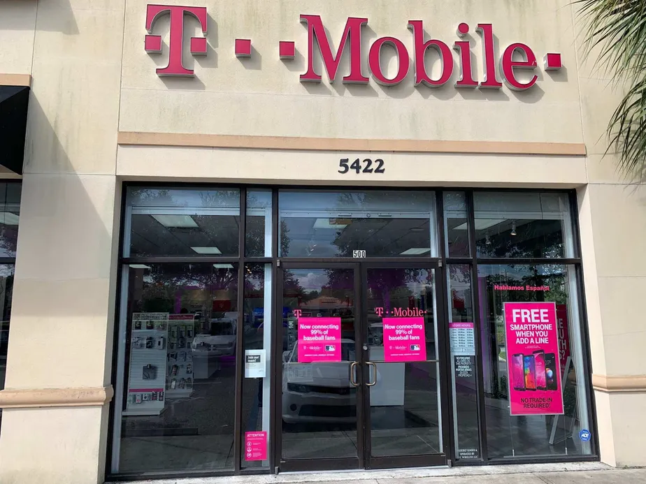 Exterior photo of T-Mobile store at Orange Blossom Trail & Winter Rose Dr, Orlando, FL