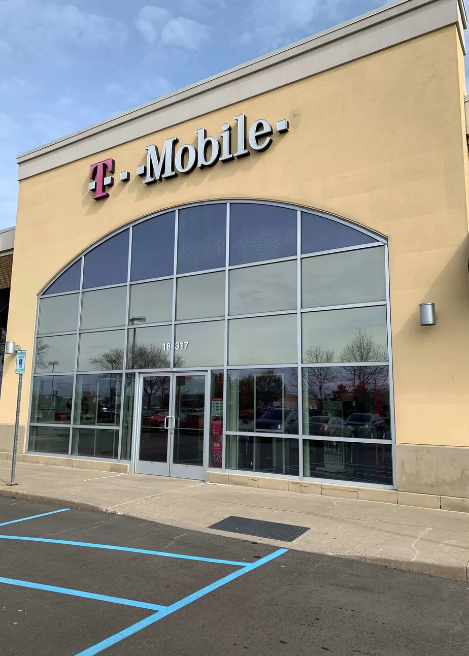Exterior photo of T-Mobile store at Hall Rd & Romeo Plank Rd., Macomb, MI