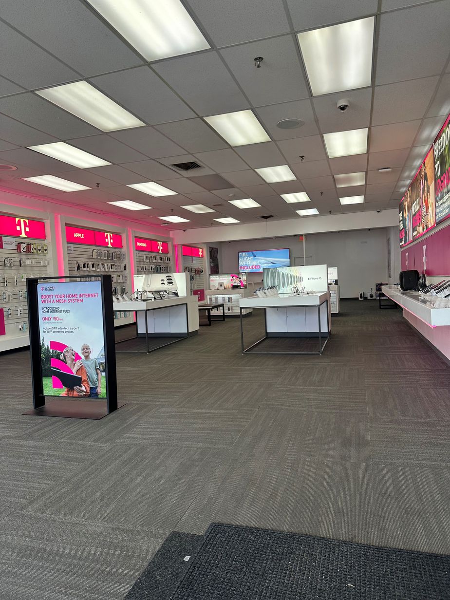 Interior photo of T-Mobile Store at River City Plaza, Waltham, MA