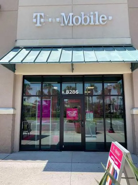Exterior photo of T-Mobile store at Champions Gate Blvd & S Goodman Rd, Davenport, FL