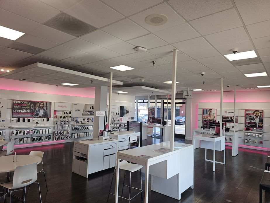 Interior photo of T-Mobile Store at Coliseum Pl & Crenshaw, Los Angeles, CA