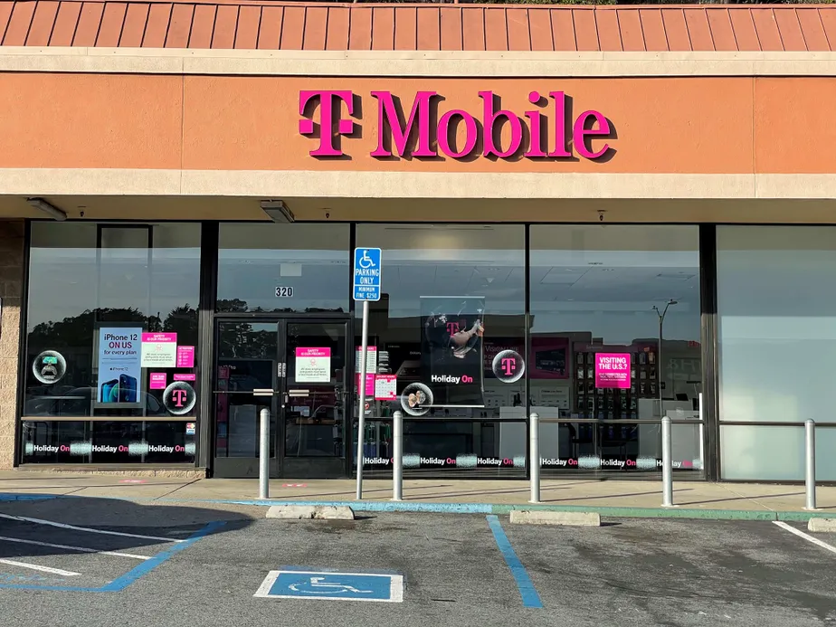 Exterior photo of T-Mobile store at Gellert Blvd & Serramonte Blvd, Daly City, CA