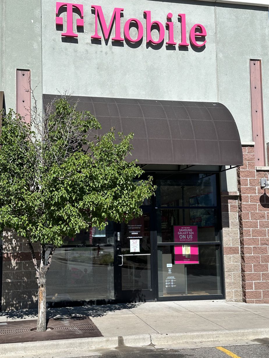 Exterior photo of T-Mobile Store at S Peoria St & E Dartmouth Ave, Aurora, CO