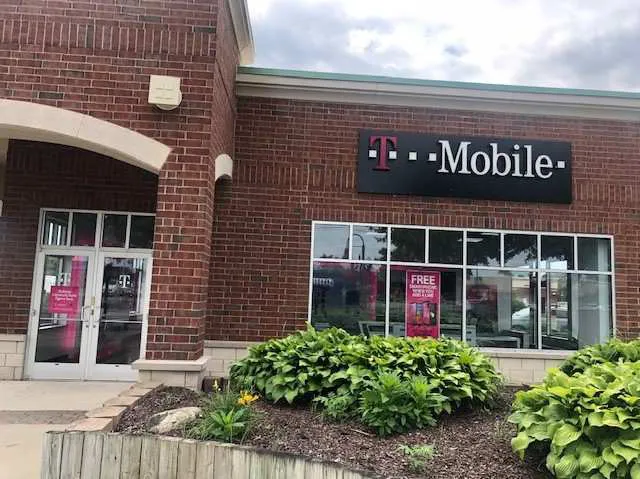  Exterior photo of T-Mobile store at W Grand River Ave & Cross Street, Brighton, MI 