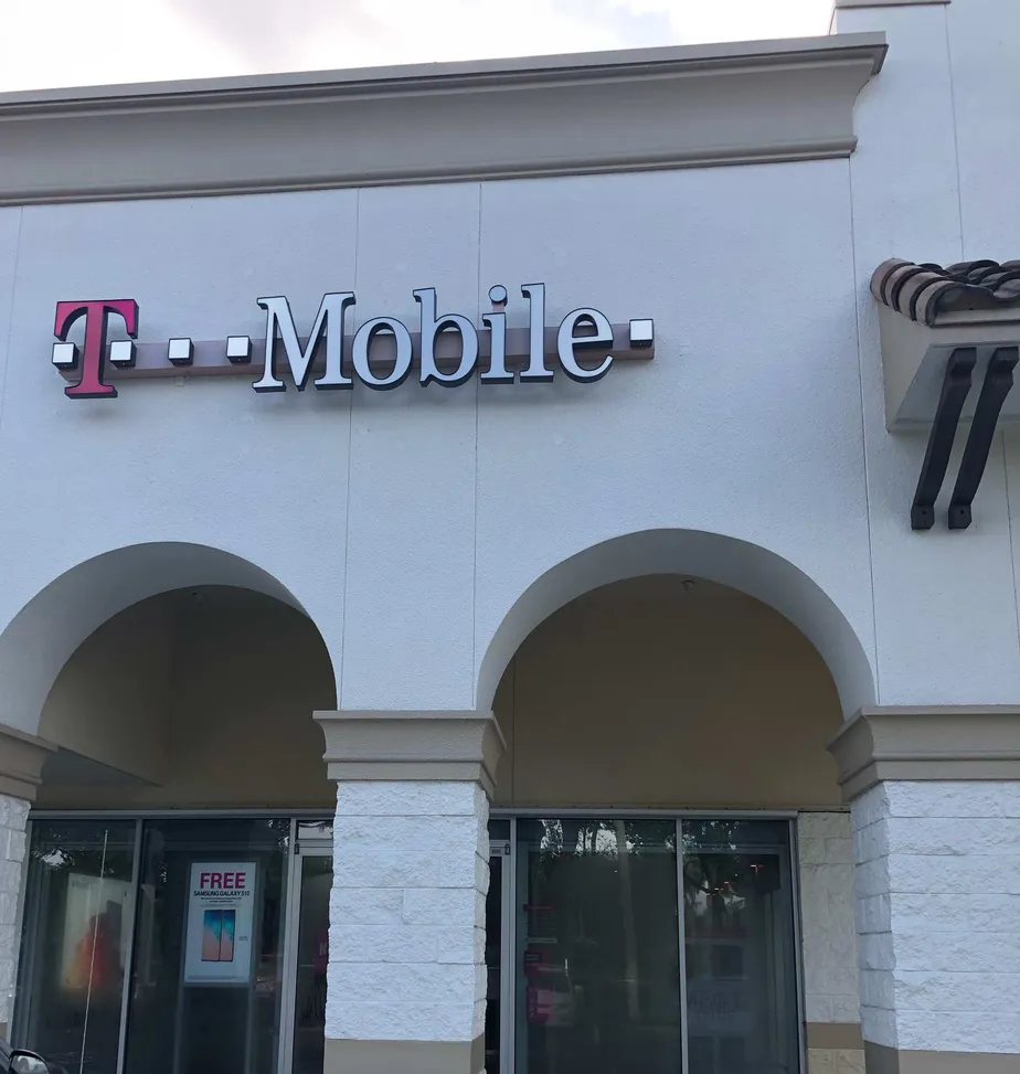 Exterior photo of T-Mobile store at Queens Blvd & 63rd Dr, Rego Park, NY