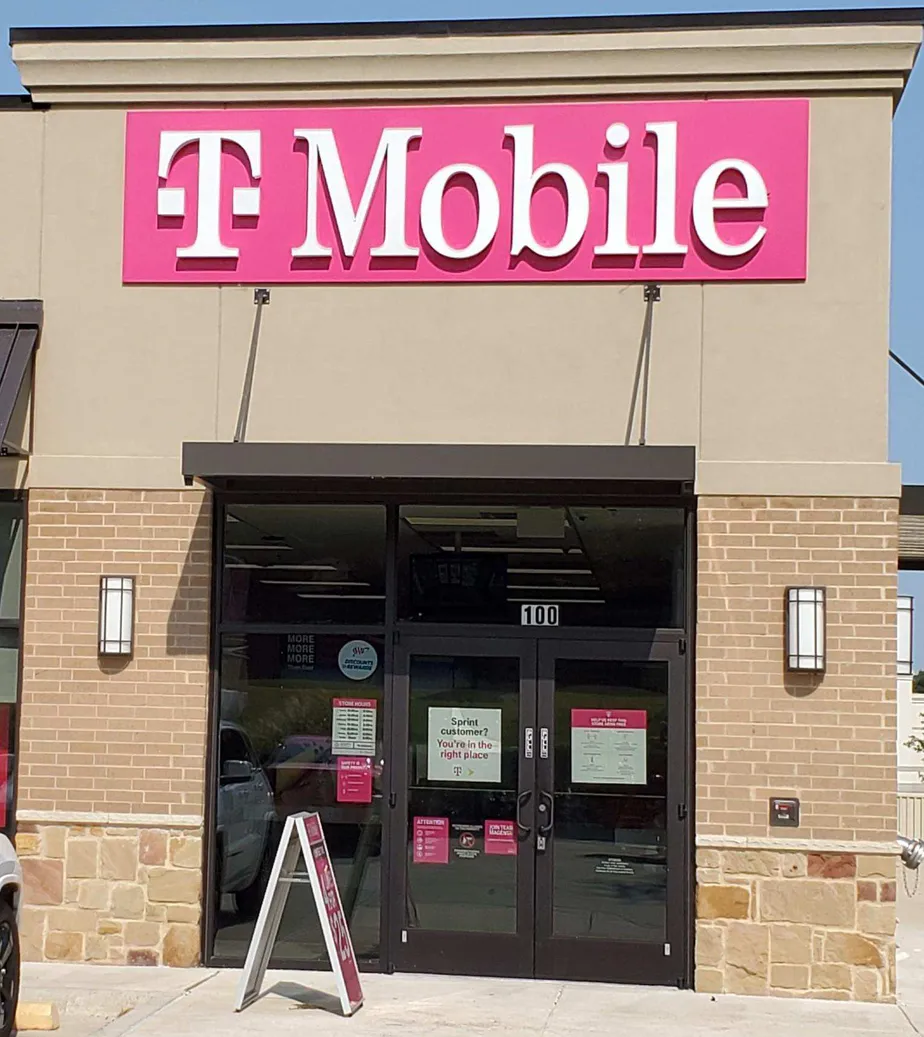 Exterior photo of T-Mobile store at Precinct Line Rd & Overhill Dr, Hurst, TX