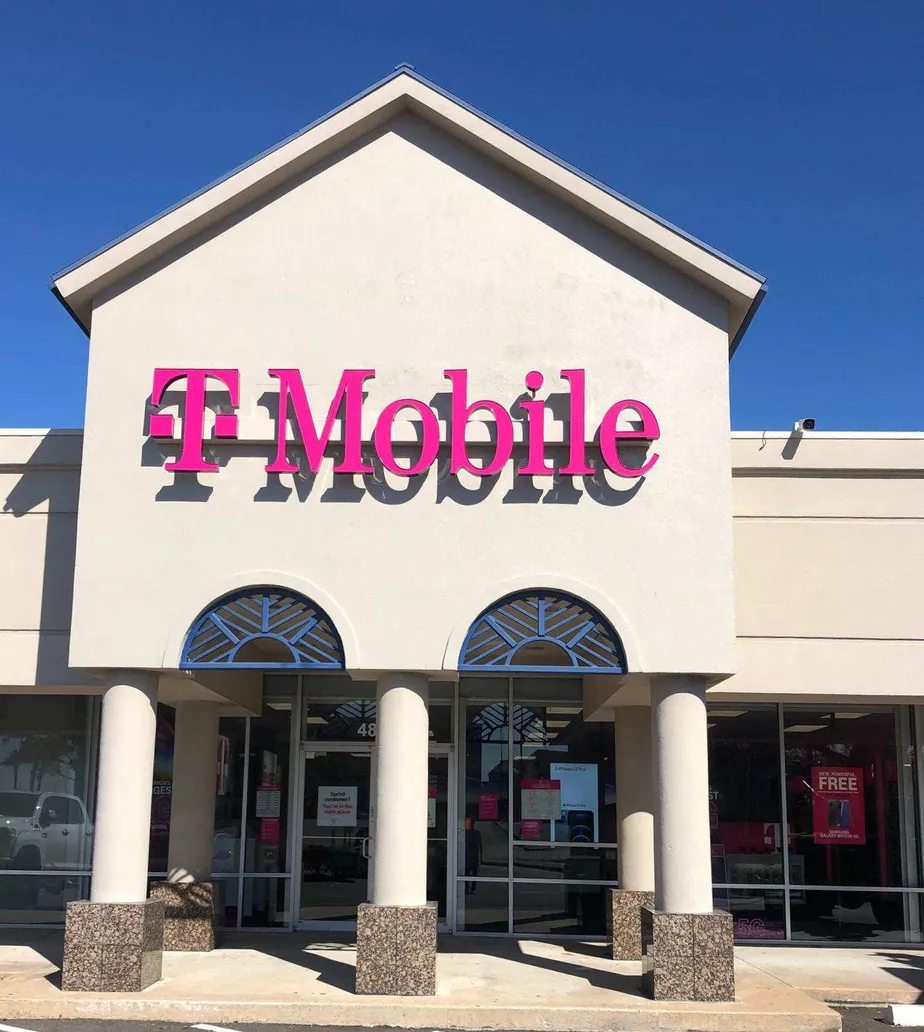 Exterior photo of T-Mobile store at Beechnut St & Endicott Ln, Houston, TX