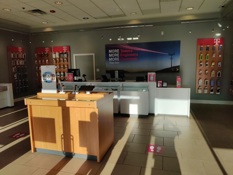 Interior photo of T-Mobile Store at Twn Center Ave & Colonnade Ave, Melbourne, FL