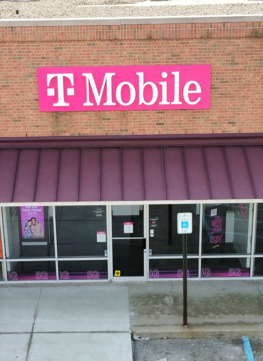 Exterior photo of T-Mobile store at Gratiot Ave & 31 Mile Rd, Richmond, MI