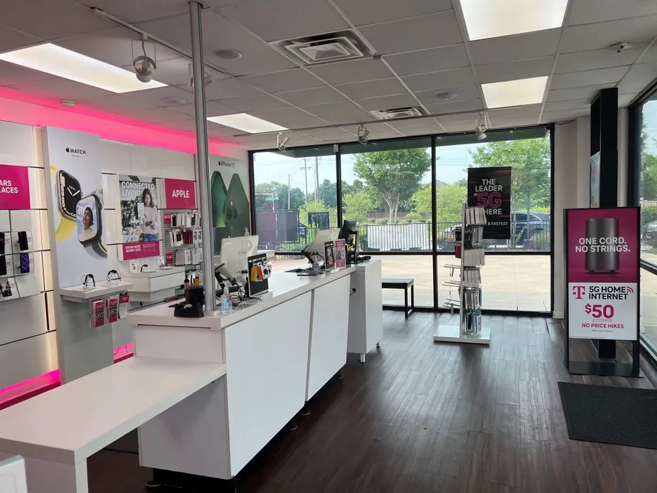 Interior photo of T-Mobile Store at E Hebron Pkwy & Medical Pkwy, Carrollton, TX