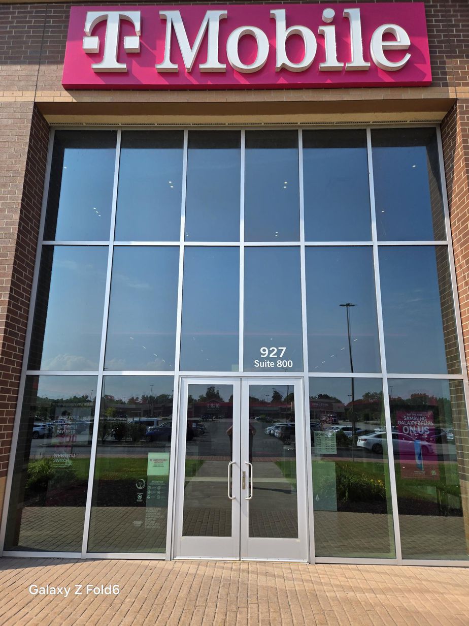 Exterior photo of T-Mobile Store at Holt Rd & Ridge Rd, Webster, NY