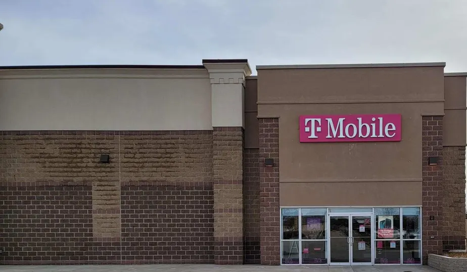 Exterior photo of T-Mobile store at Greenbriar Dr & Patroit Dr, Normal, IL