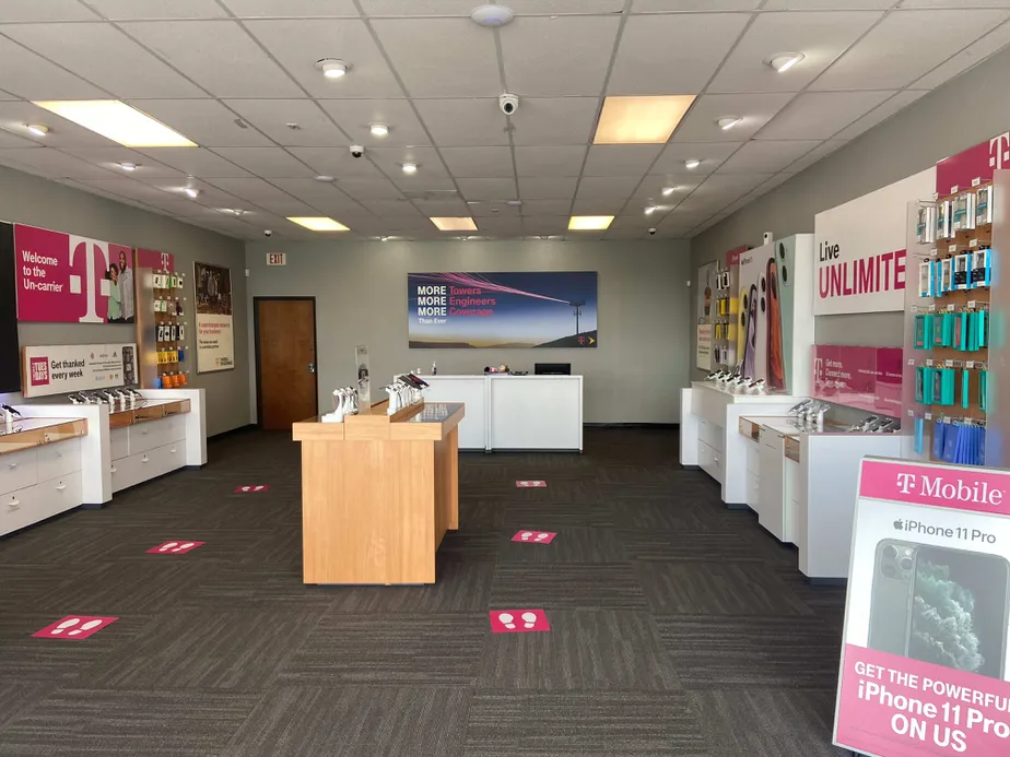 Interior photo of T-Mobile Store at E Belt Line Rd & S Plano Rd, Richardson, TX