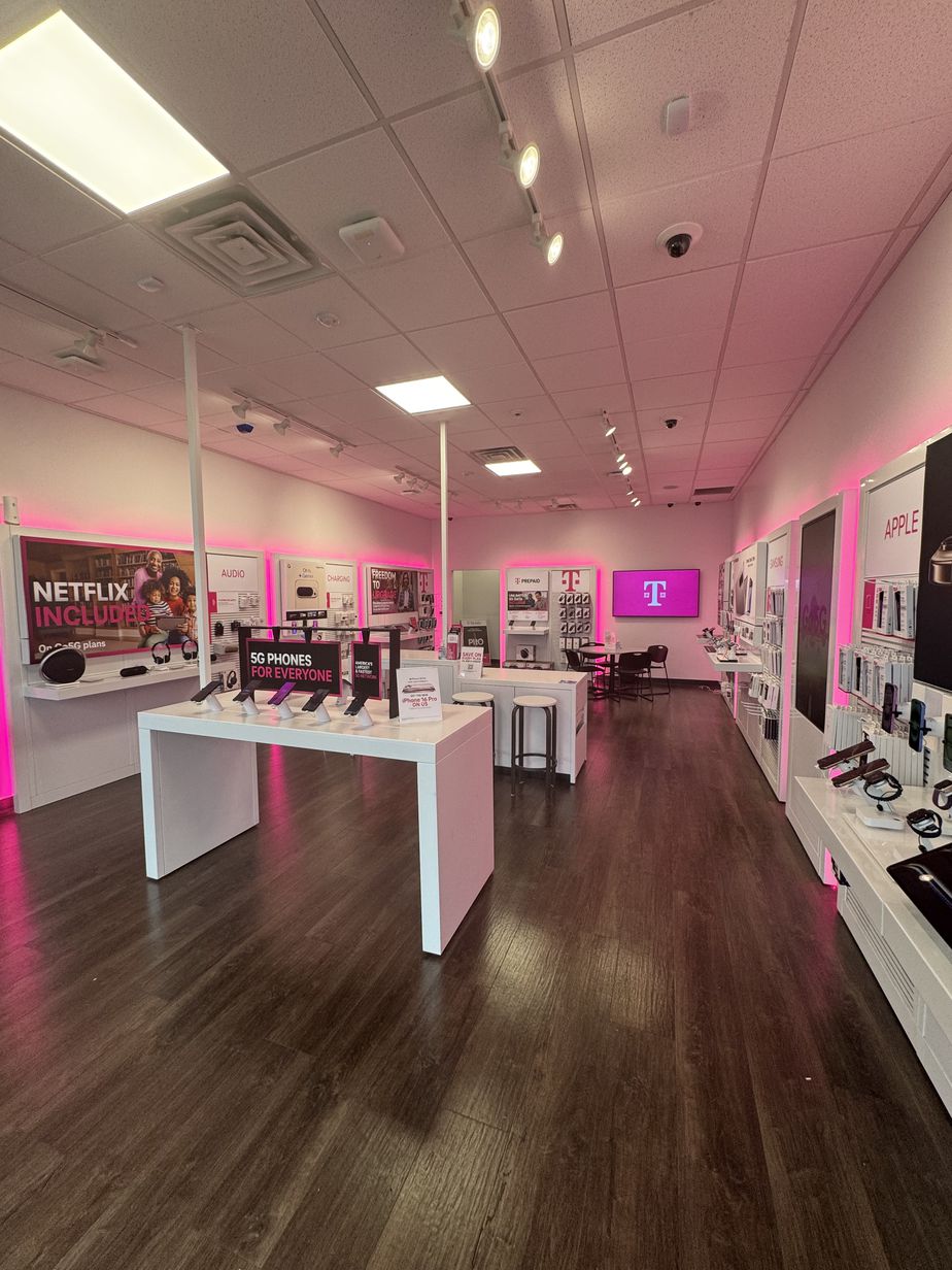 Interior photo of T-Mobile Store at West Shore Dr & Riley St, Holland, MI