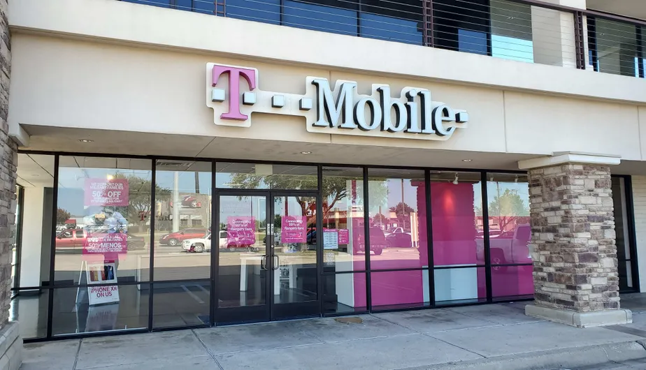 Exterior photo of T-Mobile Store at Rufe Snow & Dick Lewis, North Richland Hills, TX