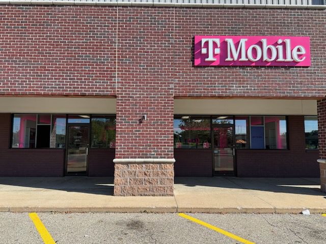 Exterior photo of T-Mobile Store at Lake Michigan Dr & 60th Ave, Allendale, MI