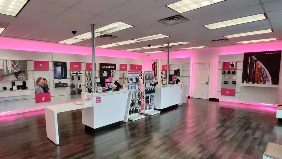 Interior photo of T-Mobile Store at W Taft Rd & Buckley Rd, Liverpool, NY