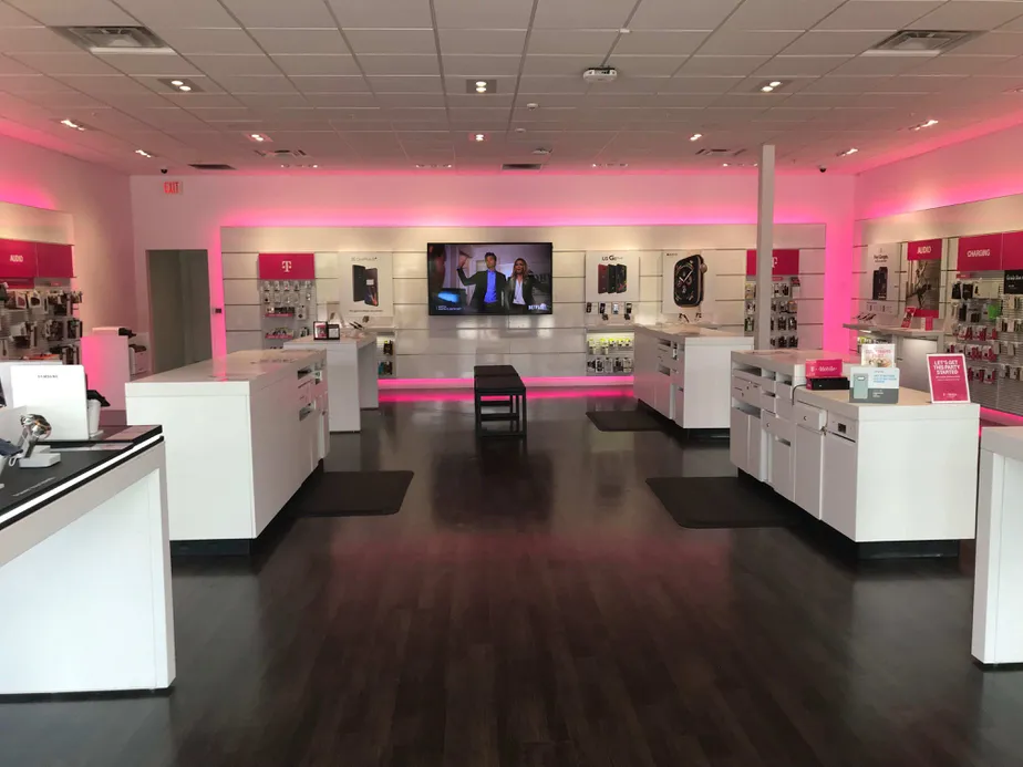 Interior photo of T-Mobile Store at Gardens Park Blvd & Millenia Blvd, Orlando, FL