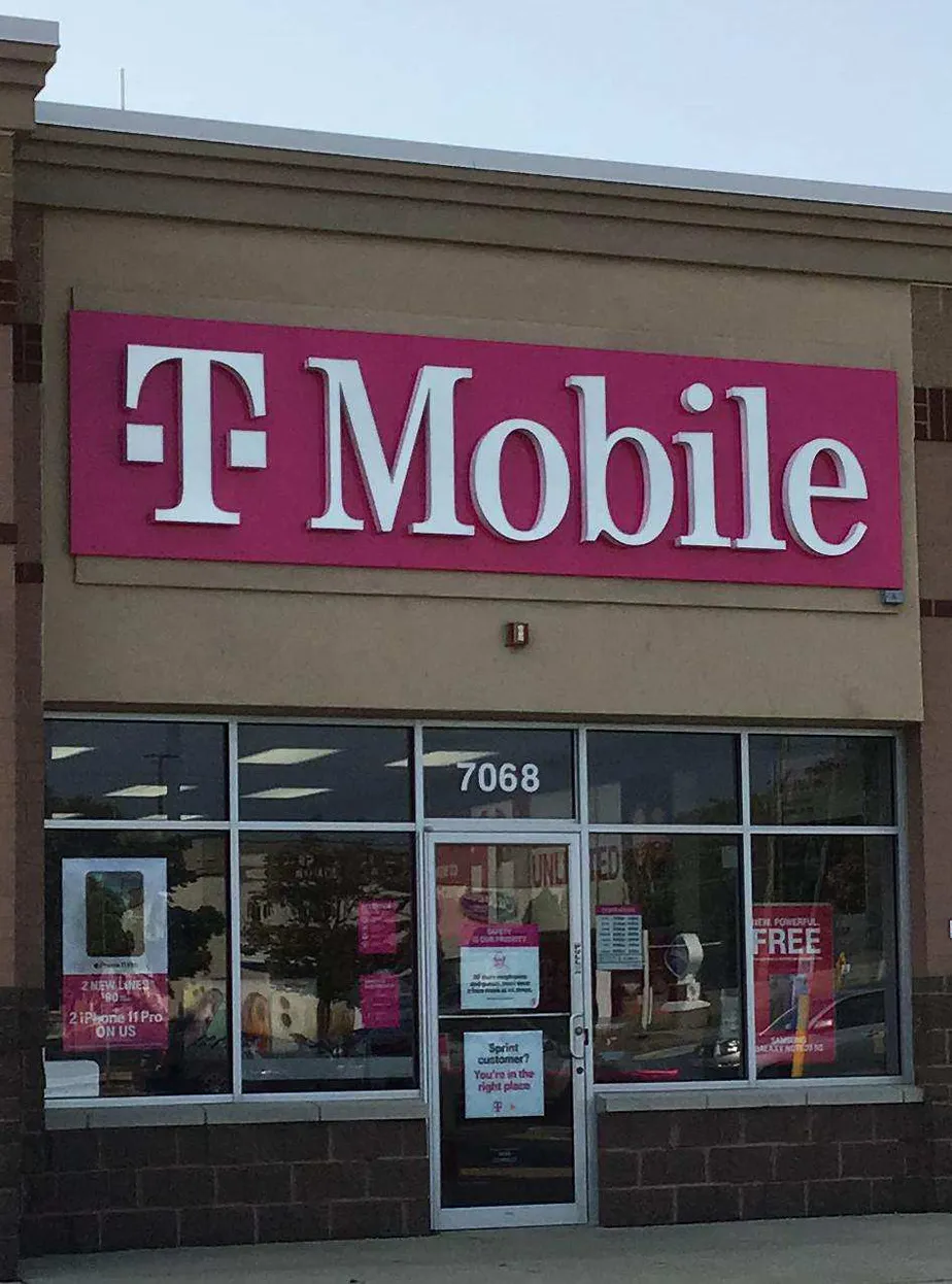 Exterior photo of T-Mobile store at Mannheim Rd & Greco Ln, Rosemont, IL