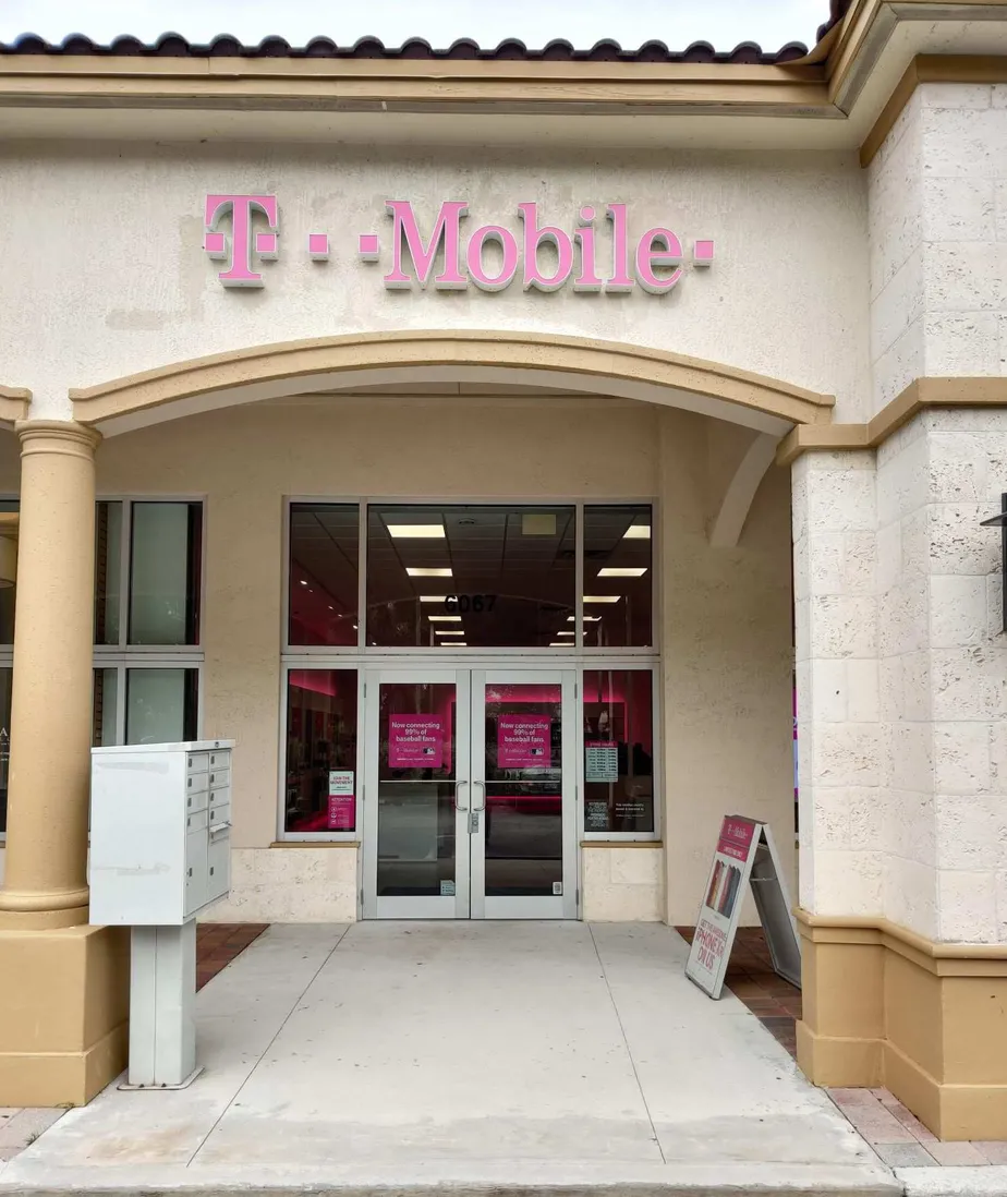 Exterior photo of T-Mobile store at Coral Ridge Dr & Holmberg Rd, Coral Springs, FL
