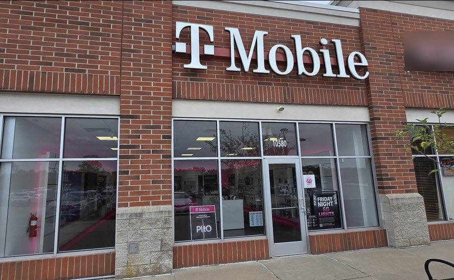 Exterior photo of T-Mobile Store at Highland Rd & Hartland Rd, Hartland, MI