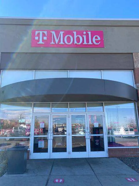 Exterior photo of T-Mobile store at Quebec St & E 38th Ave, Denver, CO