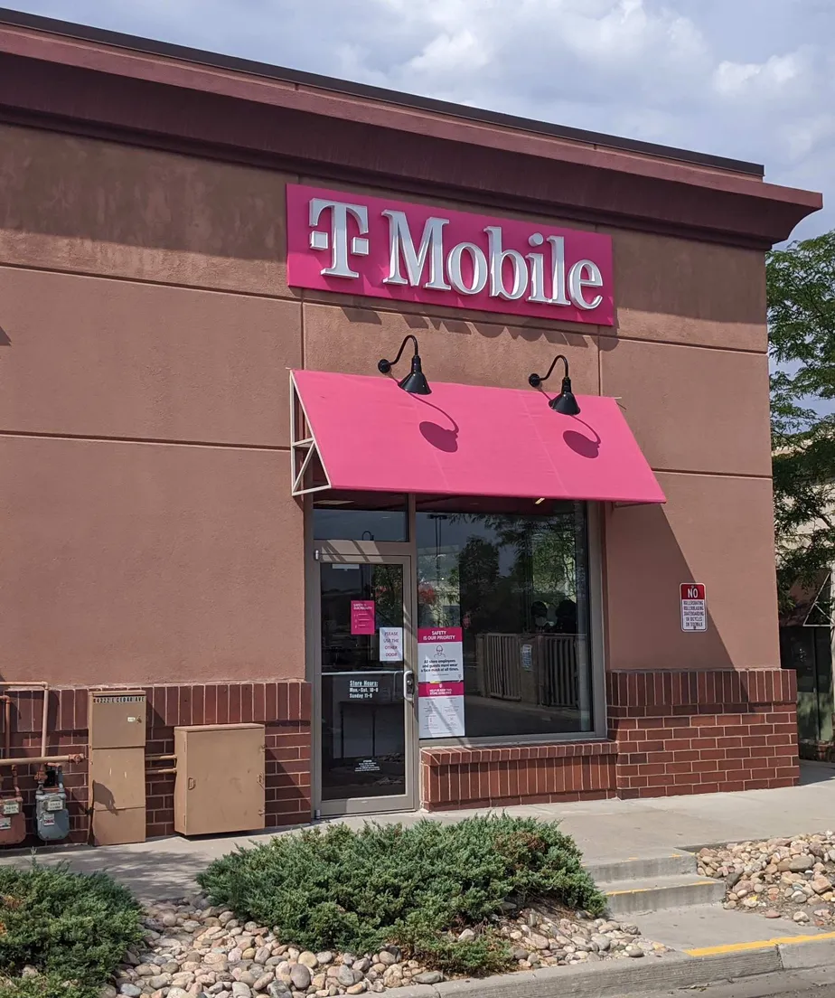 Exterior photo of T-Mobile store at E Cedar Ave & Crystal St, Aurora, CO