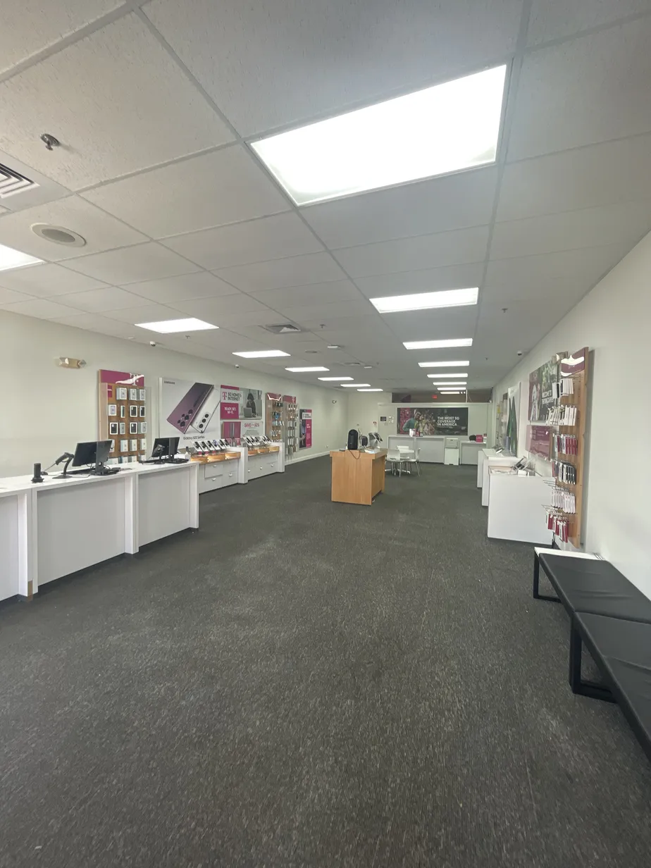 Interior photo of T-Mobile Store at Pleasant Hill Rd & Bellalago Dr, Kissimmee, FL