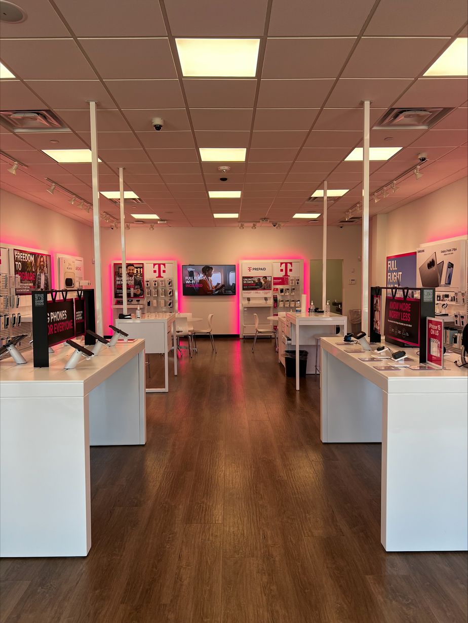 Interior photo of T-Mobile Store at Magnolia Village, Magnolia, TX