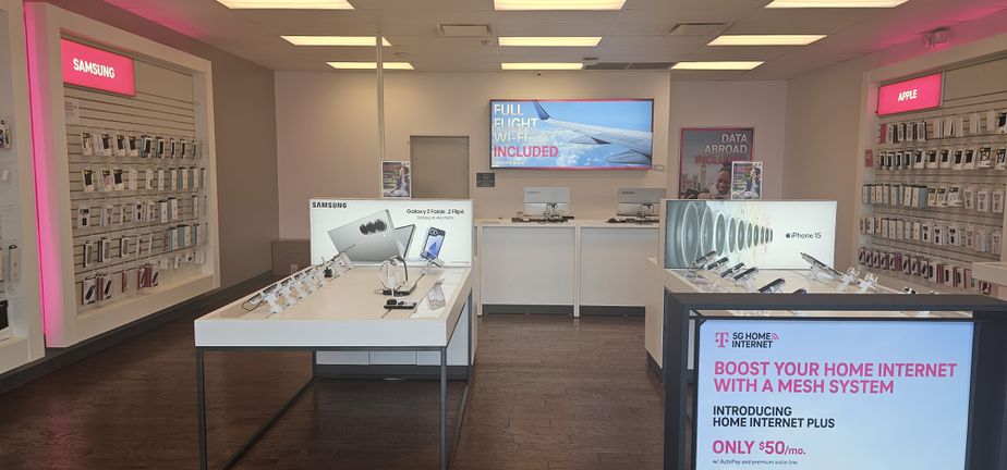 Interior photo of T-Mobile Store at Airport Fwy & Central Dr, Bedford, TX