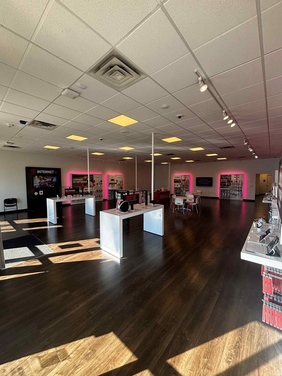 Interior photo of T-Mobile Store at Promenade & Rife Medical, Rogers, AR