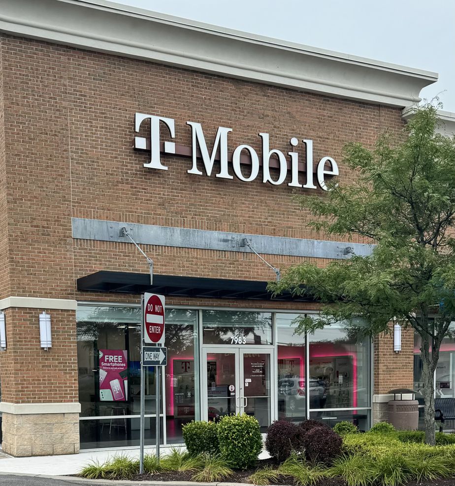 Exterior photo of T-Mobile Store at Brewerton Rd & Caughdenoy Rd, Cicero, NY