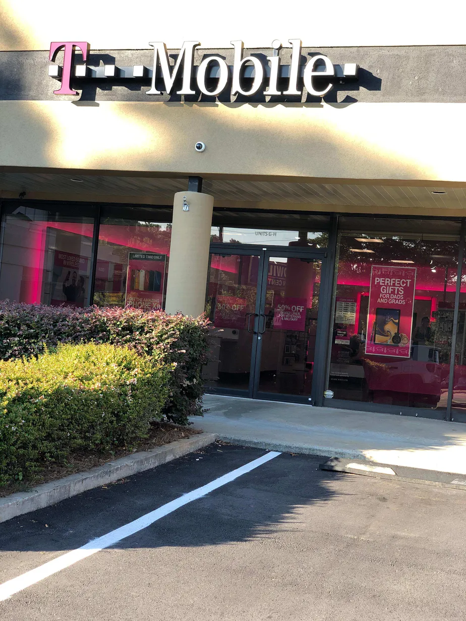 Exterior photo of T-Mobile store at Monroe Dr Ne & Piedmont Ave Ne, Atlanta, GA