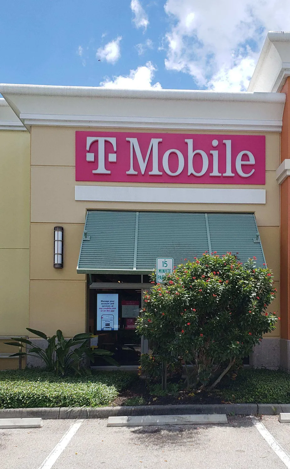 Exterior photo of T-Mobile store at Tamiami Trl N & 106th Ave N, Naples, FL
