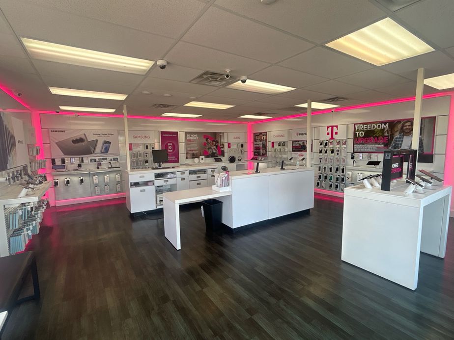 Interior photo of T-Mobile Store at Geo Washington Bvld & E Harry St, Wichita, KS