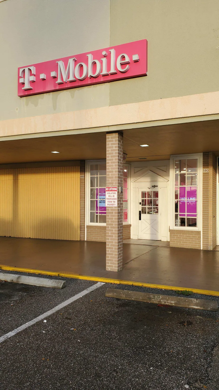 Exterior photo of T-Mobile store at S Mccall Rd & Manor Rd, Englewood, FL