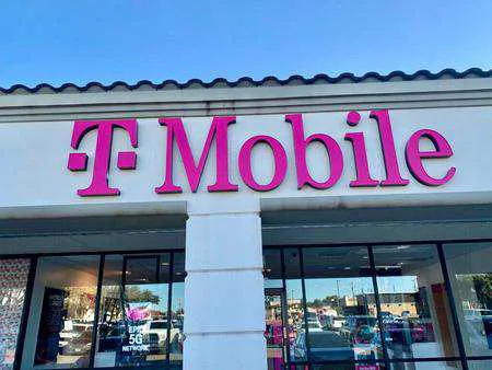 Exterior photo of T-Mobile store at N Collins St & Andrews St, Arlington, TX