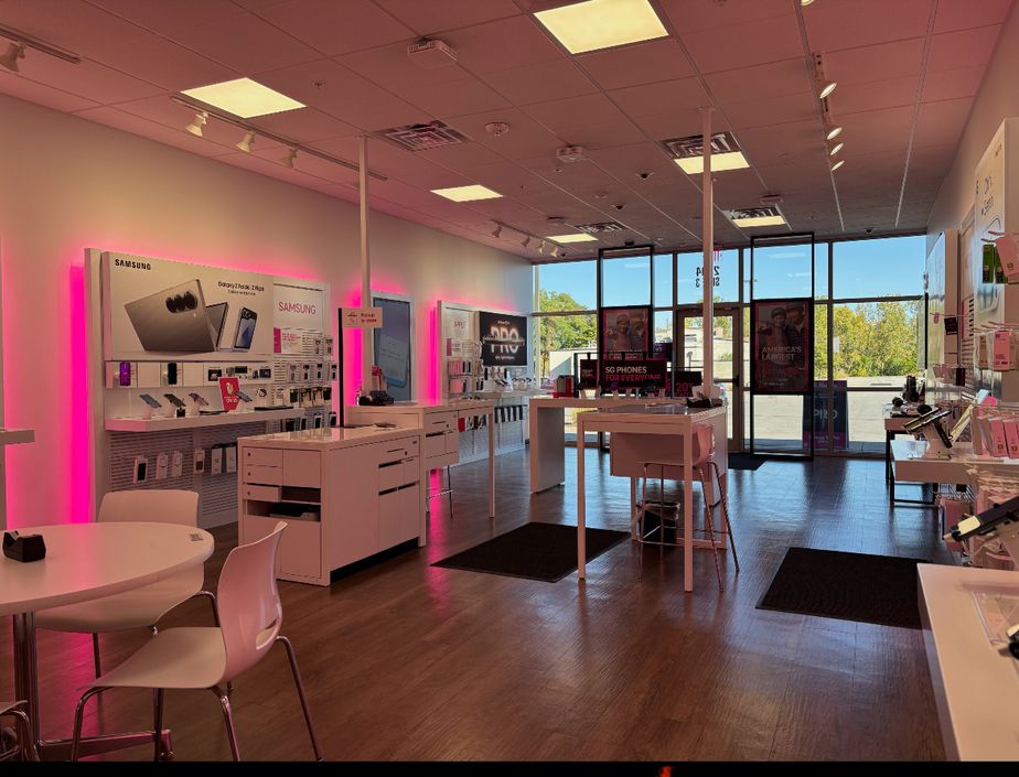 Interior photo of T-Mobile Store at Blues Hwy & 2nd Ave, Muscatine, IA