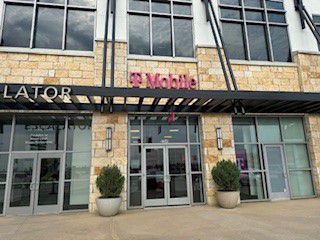 Exterior photo of T-Mobile Store at Park Ln & N Central Expy, Dallas, TX