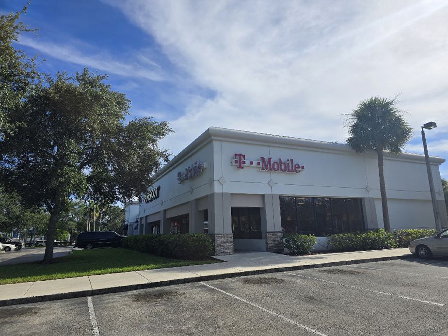 Exterior photo of T-Mobile Store at Powerline & Atlantic, Pompano Beach, FL