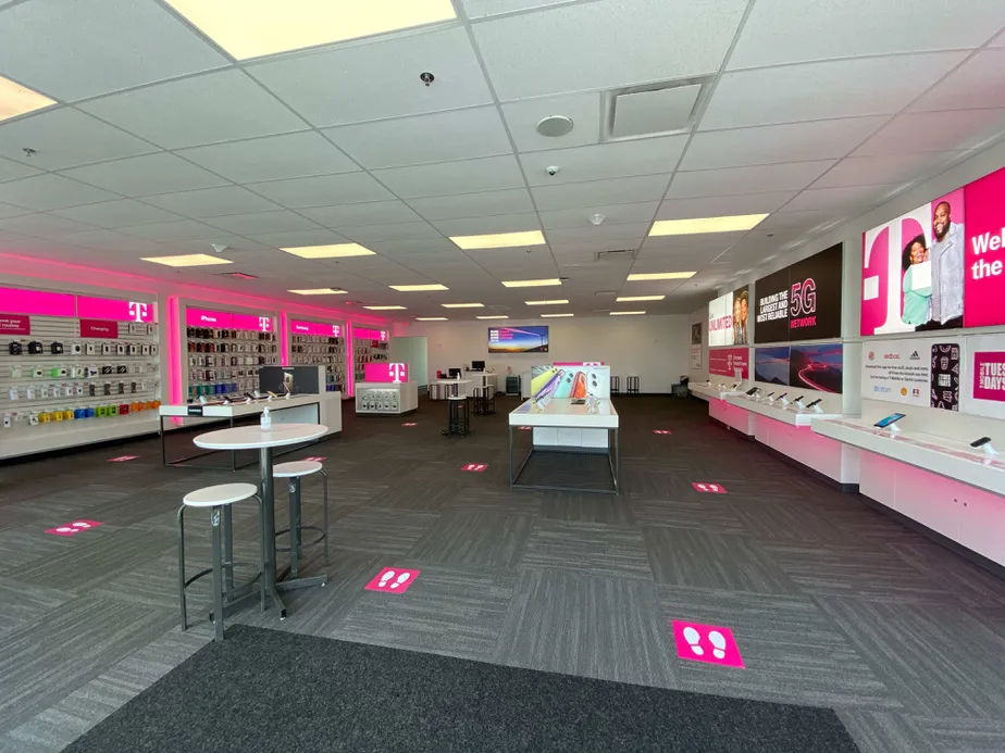Interior photo of T-Mobile Store at Eagle Watch Dr & Hazeltine National Dr, Orlando, FL