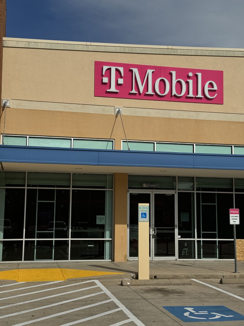 Exterior photo of T-Mobile Store at Main & Braesmain, Houston, TX