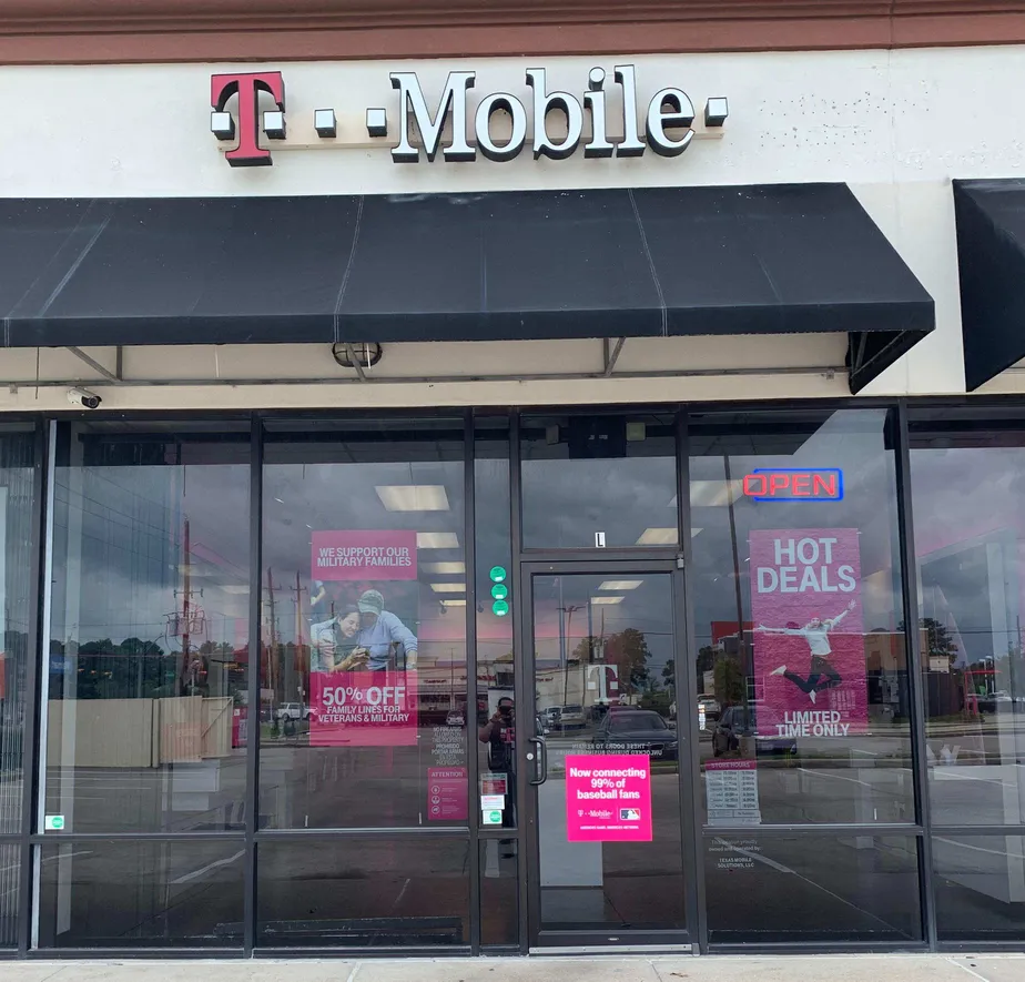 Exterior photo of T-Mobile store at Fm 2100 Rd & Springfield Blvd, Crosby, TX