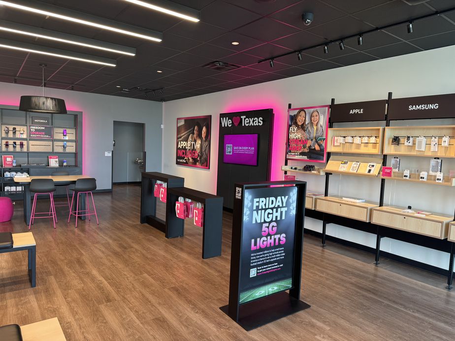 Interior photo of T-Mobile Store at Walton Dr & Kings Fort Pkwy, Kaufman, TX